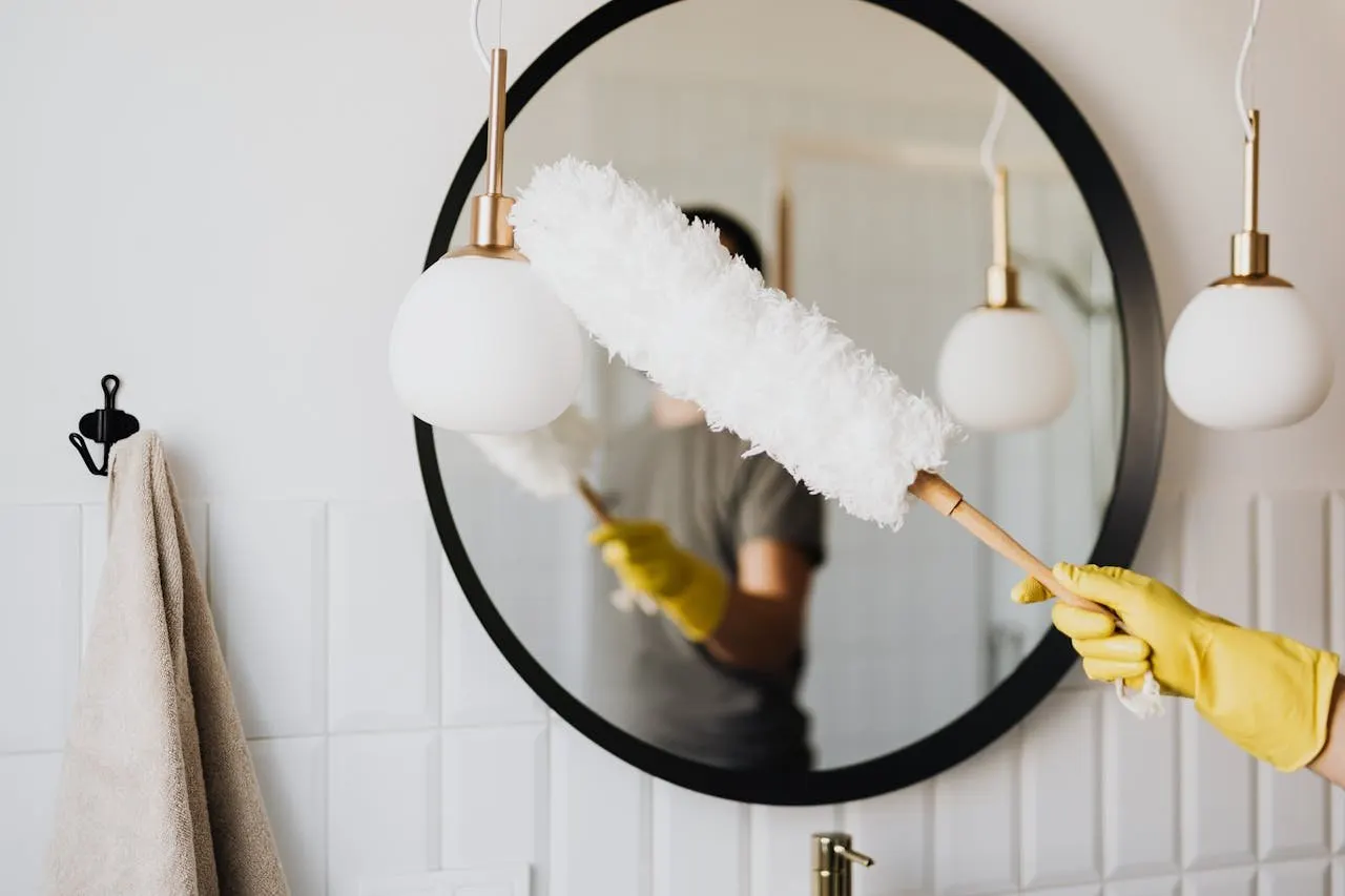 Bathroom being sanitized between guest stays